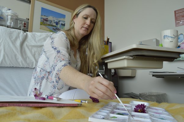 Springs artist Kristen Somody Whalen painted while on bed rest at Stony Brook University Hospital before giving birth to her first child, son Stetson Jax, on May 29. She revived a series she had previously created, called "Flowers With Legs," where women with pregnant bellies do fun activities, except their heads are replaced with real flowers. ALYSSA MELILLO