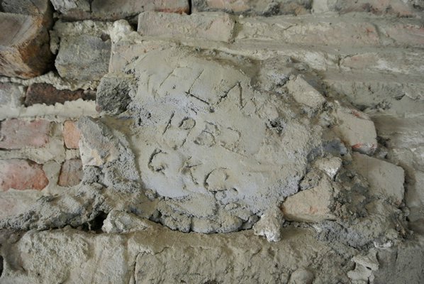Mortar on the chimney shows a date of 1938 and the initials C.K.C.   DANA SHAW