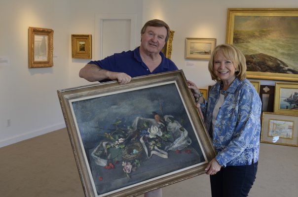 A painting is evaluated by Terry Wallace of the Wallace Gallery. ERIN MCKINLEY BY ERIN MCKINLEY