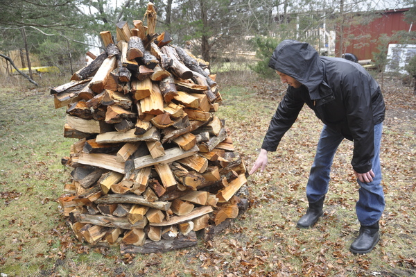 Brian Bailey explains how he uses the holz hausen wood-stacking method.