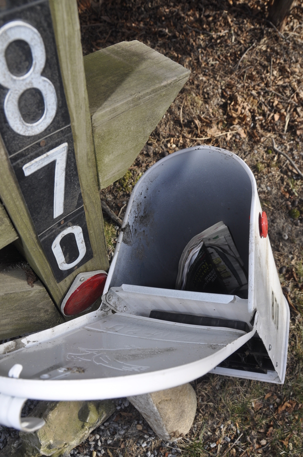 A damaged, and seemingly repaired, mailbox on Noyac Road.