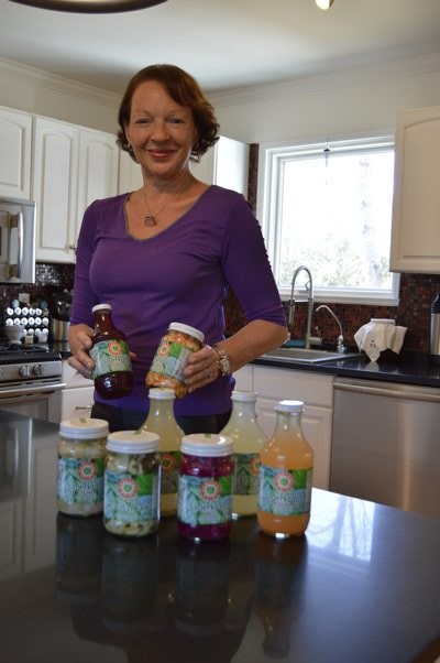 Nadia Ernestus with some Hamptons Brine products at her home in Sag Harbor last week. ALYSSA MELILLO