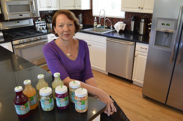 Nadia Ernestus with some Hamptons Brine products at her home in Sag Harbor last week. ALYSSA MELILLO