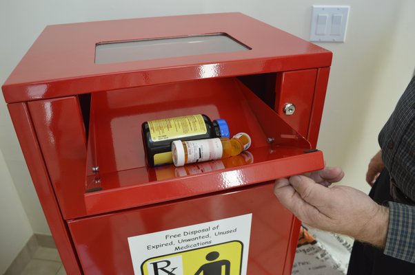 After building a prototype out of wood, Thomas McAbee had Metal Crafters of Ronkonkoma make this first of its kind pharmaceutical receptacle, to be placed in the Southampton Village Police Department in October. BRANDON B. QUINN