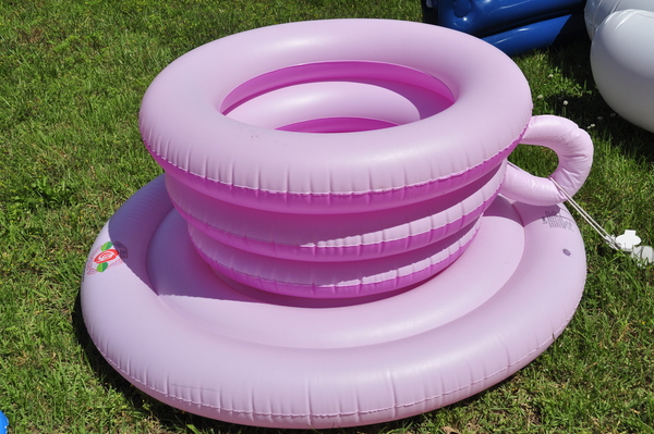 An inflatable teacup pool float at Spring & Summer Activities in Hampton Bays.