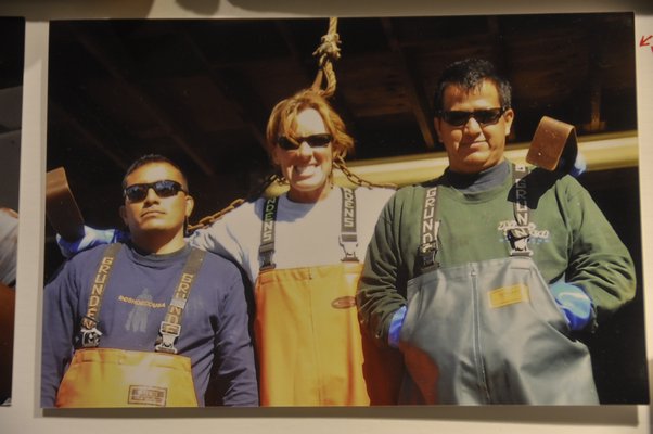 Wendi Blair, center, worked as a dockhand for Inlet Seafood for a year with Coco and Gerson. MICHELLE TRAURING