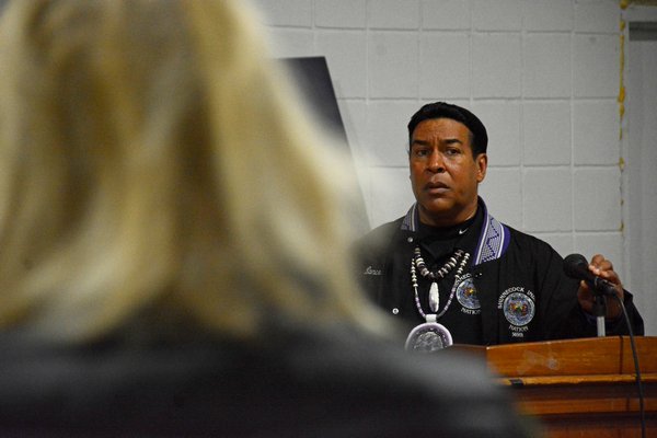 Tribe Trustee Lance Gumbs welcomes non-native guests to the Shinnecock Indian Nation's harvest celebraion. JD ALLEN
