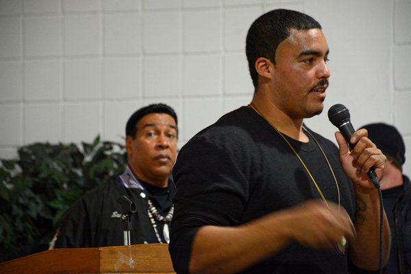Shane Weeks addresses his fellow members of the Shinnecock as Tribe Trustee Lance Gumbs looks on. JD ALLEN