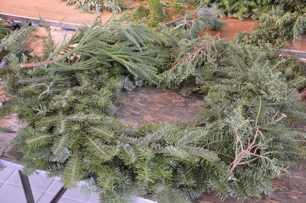Choose a plain balsam wreath from a garden center. SHAYE WEAVER