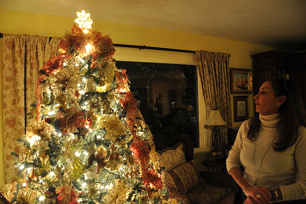 Catherine Paez with her famiy’s Christmas tree in Southampton. MICHELLE TRAURING
