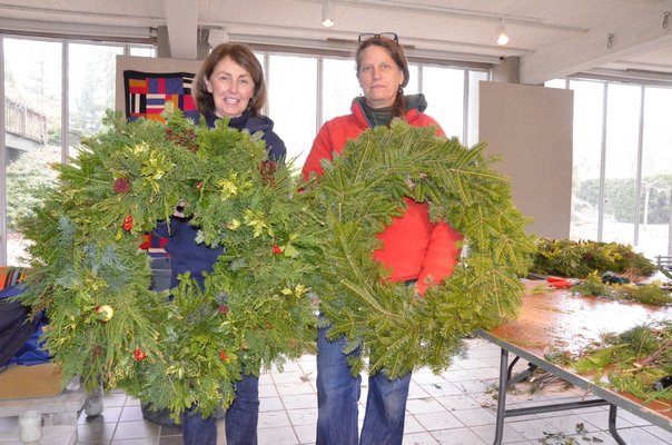Irene and Florence Rewinski show the before and after. Find the top of your wreath, which depends on how you'd like it to hang, and string a long, sturdy wire around the base and hang it up. SHAYE WEAVER