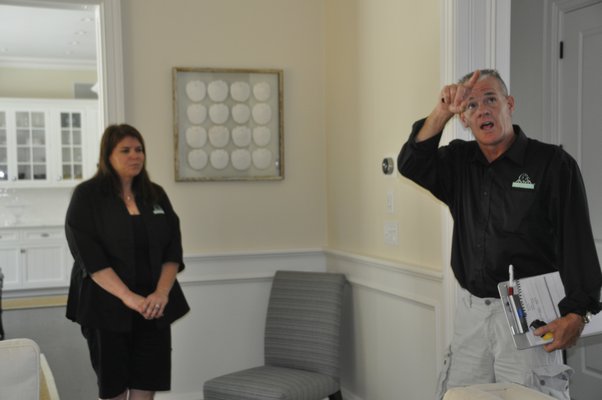 Chris Capalbo and Cynthia Ward Capalbo inspect a home in Sag Harbor. MICHELLE TRAURING