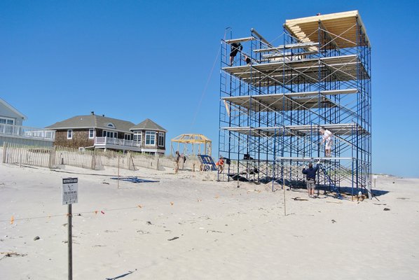 A scaffold for the film "The Other Woman has gone up on the beach in East Quogue between two nesting areas. DANA SHAW DANA SHAW