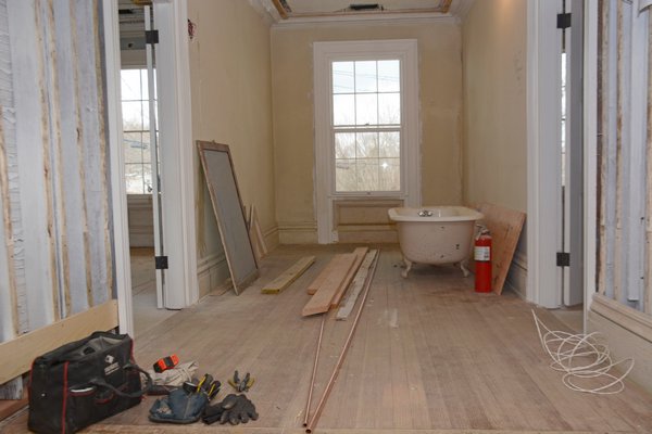 A clawfoot bathtub was moved out into the second-floor hall during while pipes and electrical work was underway. JD ALLEN