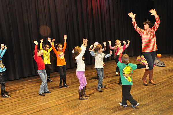 Kristen Poulakis teaches dance during Vaudeville Kids on the Hampton Bays Middle School stage. MICHELLE TRAURING