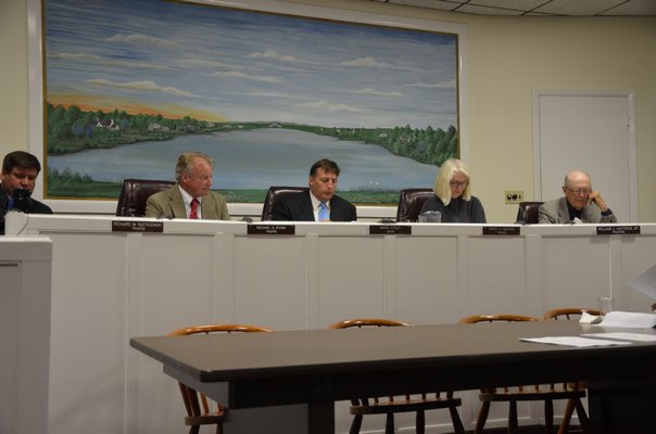 Southampton Village Board members, Mayor Mark Epley and Trustee Nancy McGann, agreed to change the date of when beach permits are required to May 15. BY SHAYE WEAVER