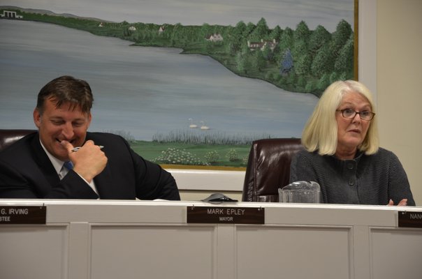 Southampton Village Board members, Mayor Mark Epley and Trustee Nancy McGann, agreed to change the date of when beach permits are required to May 15. BY SHAYE WEAVER