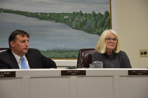 Southampton Village Board members, Mayor Mark Epley and Trustee Nancy McGann, agreed to change the date of when beach permits are required to May 15. BY SHAYE WEAVER