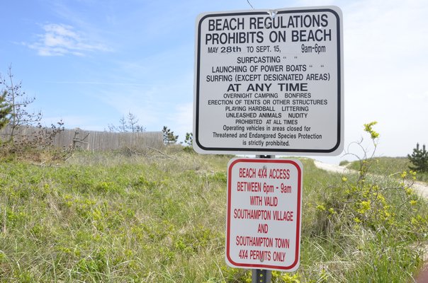 Village beach permit signs will no longer need to be changed under the new law. BY SHAYE WEAVER