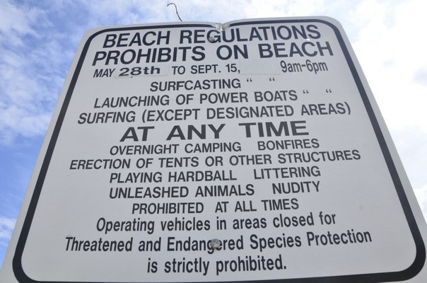 Village beach permit signs will no longer need to be changed under the new law. BY SHAYE WEAVER