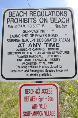 Village beach permit signs will no longer need to be changed under the new law. BY SHAYE WEAVER