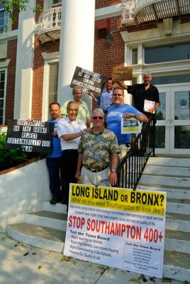 Opponents of the proposed Southampton Town sustainability plan gathered before a hearing on the steps of Town Hall on Tuesday evening. DANA SHAW