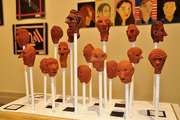 A collection of heads from the East Hampton High School studio art class are on display at Guild Hall, as part of the 21st annual "Student Art Festival Part II." MICHELLE TRAURING