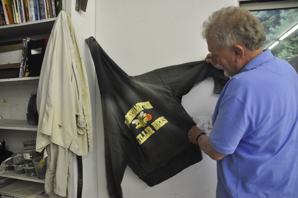 Artist Joe Zucker with his Bridgehampton Killer Bees sweatshirt in his East Hampton studio.