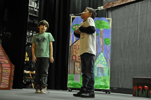 The Springs School Opera Company rehearses its original production, "Dogs Don't Talk," at Guild Hall in East Hampton. MICHELLE TRAURING