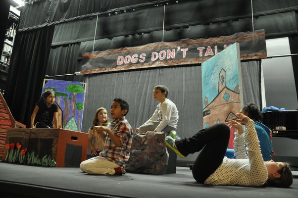 The Springs School Opera Company rehearses its original production, "Dogs Don't Talk," at Guild Hall in East Hampton. MICHELLE TRAURING