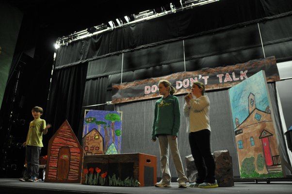 The Springs School Opera Company rehearses its original production, "Dogs Don't Talk," at Guild Hall in East Hampton. MICHELLE TRAURING