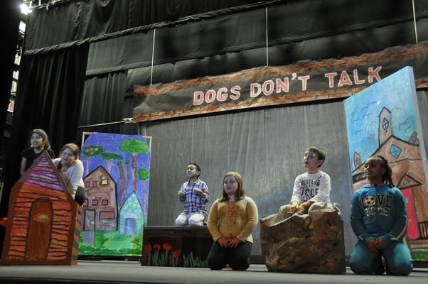 The Springs School Opera Company rehearses its original production, "Dogs Don't Talk," at Guild Hall in East Hampton. MICHELLE TRAURING