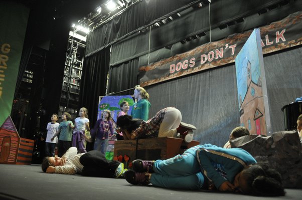 The Springs School Opera Company rehearses its original production, "Dogs Don't Talk," at Guild Hall in East Hampton. MICHELLE TRAURING