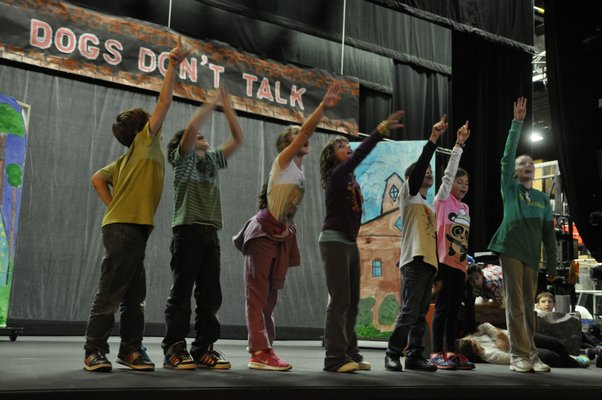 The Springs School Opera Company rehearses its original production, "Dogs Don't Talk," at Guild Hall in East Hampton. MICHELLE TRAURING