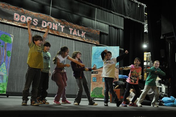 The Springs School Opera Company rehearses its original production, "Dogs Don't Talk," at Guild Hall in East Hampton. MICHELLE TRAURING MICHELLE TRAURING
