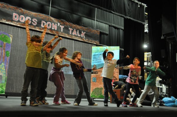 The Springs School Opera Company rehearses its original production, "Dogs Don't Talk," at Guild Hall in East Hampton. MICHELLE TRAURING