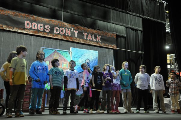 The Springs School Opera Company rehearses its original production, "Dogs Don't Talk," at Guild Hall in East Hampton. MICHELLE TRAURING