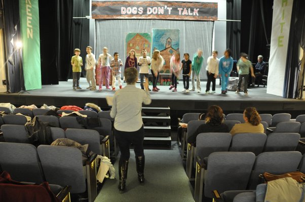 The Springs School Opera Company rehearses its original production, "Dogs Don't Talk," at Guild Hall in East Hampton. MICHELLE TRAURING