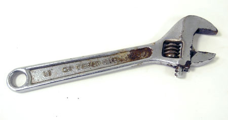 A wrench is used for tightening bolts and nuts.
