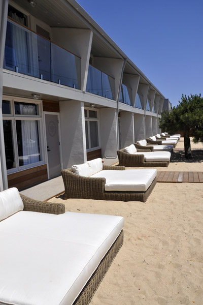 Day beds in white sand gardens outside the "Whitewater Garden" rooms of The Montauk Beach House. MICHELLE TRAURING