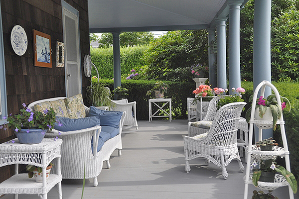 Virginia Connolly keeps her porch in line with her garden by utilizing potted plants. MICHELLE TRAURING