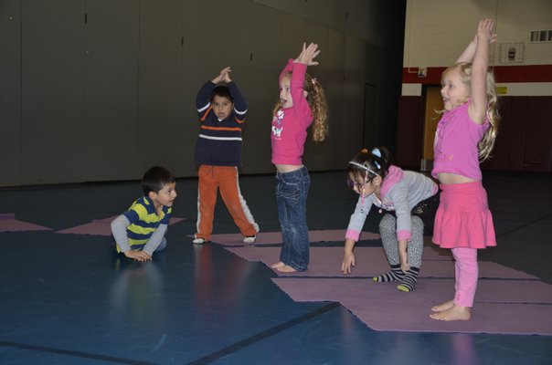 John Marshall Elementary School Students take yoga with Heidi Humes. SHAYE WEAVER