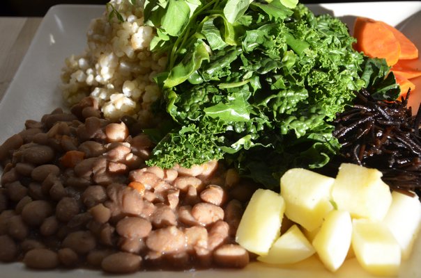 A vegan dish, created by Privisons Chef Dennis MacNeil, called "Baby Buddha," containing brown rice, beans, steamed vegetables, sea vegetables. SHAYE WEAVER