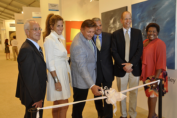 Mark Epley, center, cuts the ribbon to Art Southampton as, from left, Steve Bernstein, Pamela Cohen, Nick Korniloff, Bob Chaloner and Brenda Simmons look on. MICHELLE TRAURING