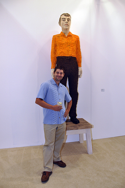 Matt Benham next to "Man with Orange Shirt" by Stephan Balkenhol. MICHELLE TRAURING