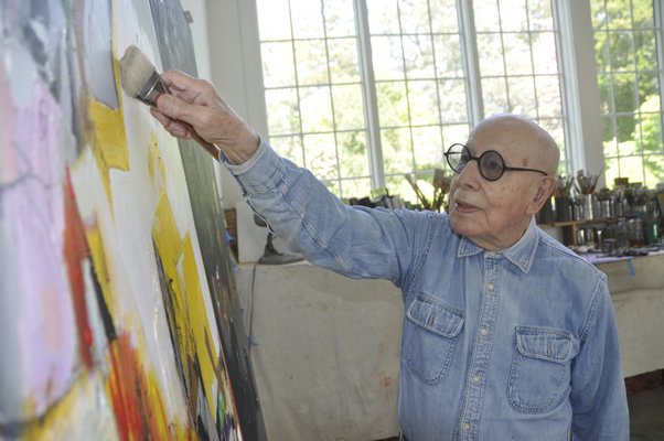 Modernist painter Gerson Leiber at work in his Springs studio. MICHELLE TRAURING