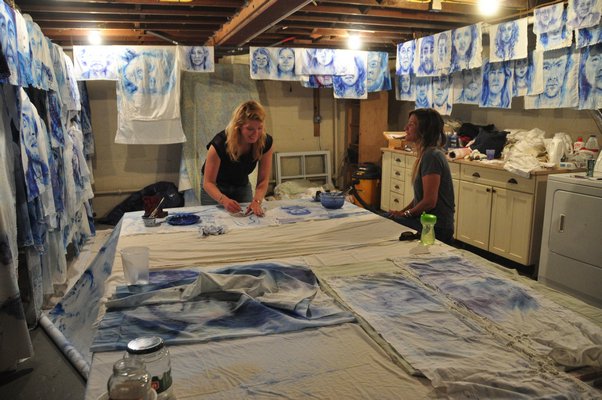 Aubrey Roemer will paint 400 portraits of Montauk locals by summer's end. MICHELLE TRAURING