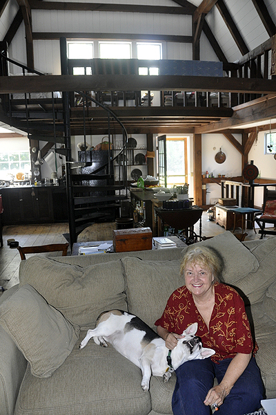 Artist Michelle Stuart gives Lola a belly rub in their Amagansett home. MICHELLE TRAURING