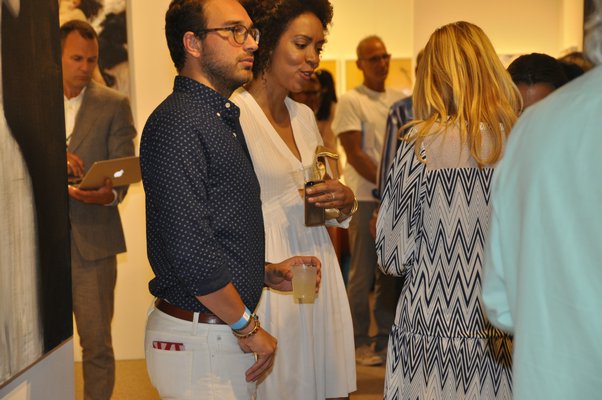 Scenes from ArtHamptons opening night. MICHELLE TRAURING