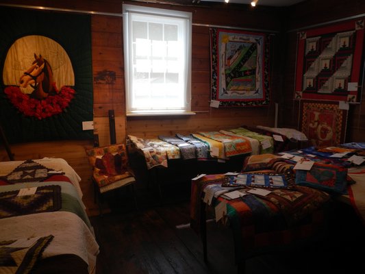 Quilts for infants and babies are a popular purchase item at the Water Mill Museum's Annual Quilt Show and Sale. CAREY LONDON